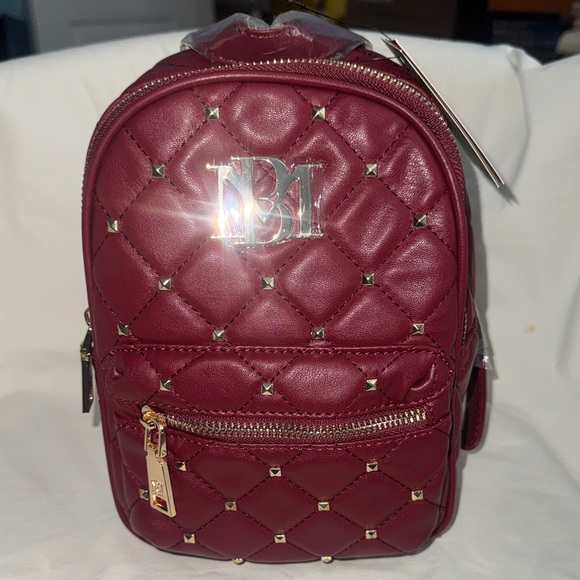 Badgley Mischka Handbags - Badgley Mischka Burgundy Quilted Mini Backpack with Gold Accents